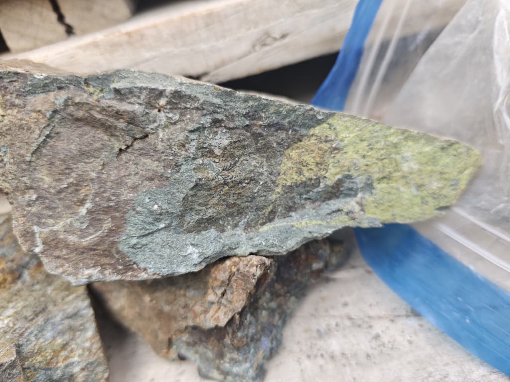 Rock with green alteration